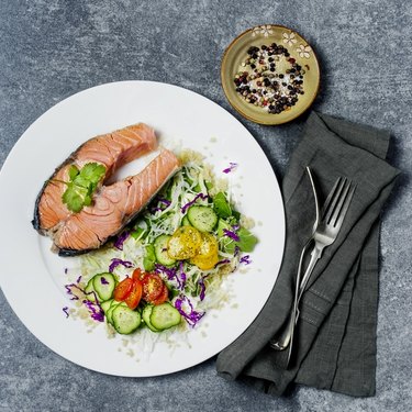 Salmon steak with salad