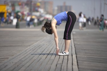 Jogger Touching Her Toes