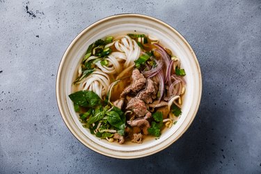 Pho Bo vietnamese Soup with beef in bowl