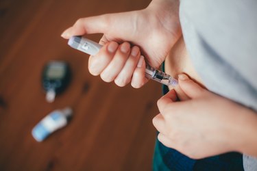 woman doing injection