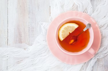 Cup of black tea with lemon