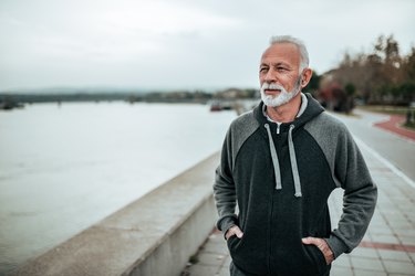 Man doing a beginner walking program by the beach