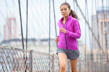 Female runner running and jogging in New York City