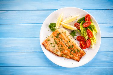 Fried cod fillets and vegetables