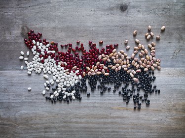 Beans on wooden background