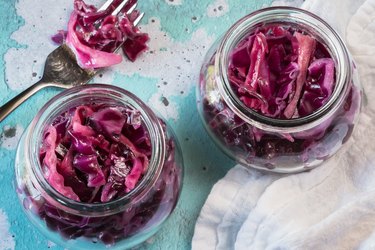High Angle View Of Pickled Cabbage In Jars
