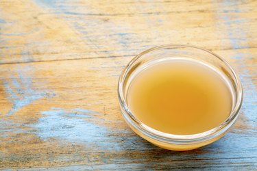shot of raw apple cider vinegar, as an example of ACV dosage