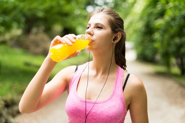 Woman drinking after sport