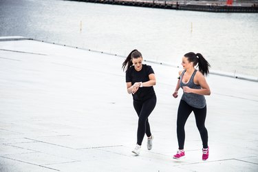 Urban runners excercising in town