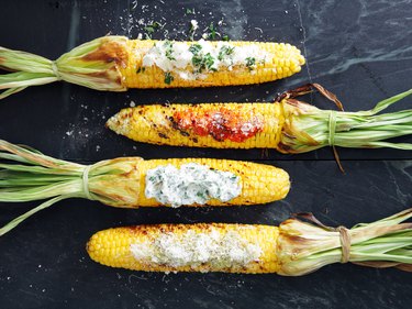 Grilled corn with toppings