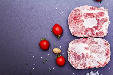 Frozen raw pork steak