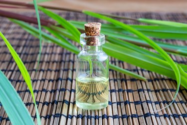 A bottle of lemon grass essential oil, as a natural remedy for dandruff