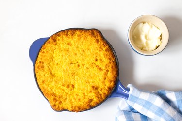 Fresh Skillet Cornbread with Butter (Close-Up); White Background