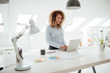 Latina Businesswoman Working In Her Office.