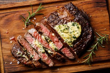 Sliced grilled steak Ribeye with herb butter