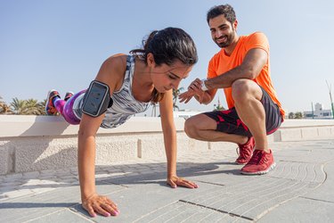 Fitness couple exercising outdoors