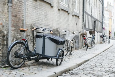 City cobbled sidewalk with bicycles
