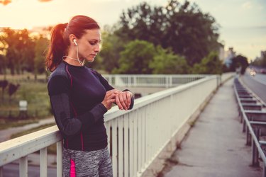 Women checking fitness tracker