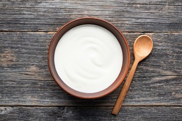 Natural yogurt in ceramic bowl