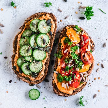 Paprika Hummus toasts with tomato and cucumber