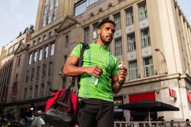 Young man walking around the city wearing sportswear