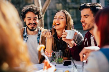 Friends eating at a restaurant