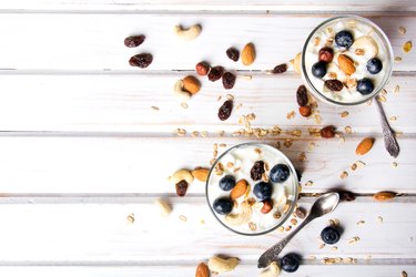 Healthy dessert with yogurt, nuts, oats and blueberries