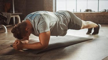 Man holding plank with proper form.