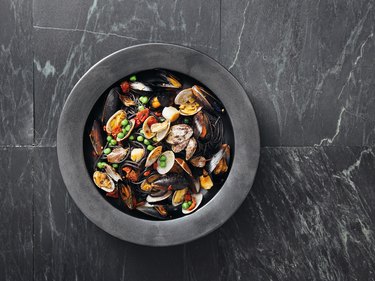 Squid ink pasta with seafood and vegetables