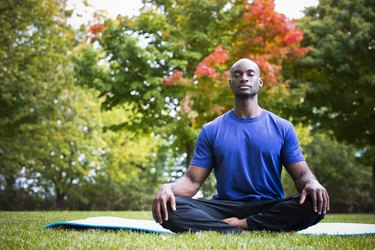 young man exercising yoga