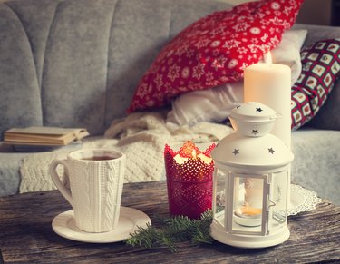 Still life interior details, cup of tea and candles