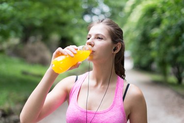 Woman drinking after sport