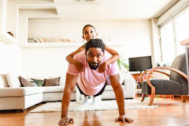 Father and son, home exercising