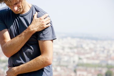 Man with rotator cuff injury doing exercises for shoulder strength