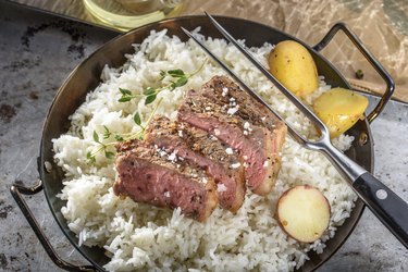 Sliced Grilled Steak with Sea Salt over Steamed Rice