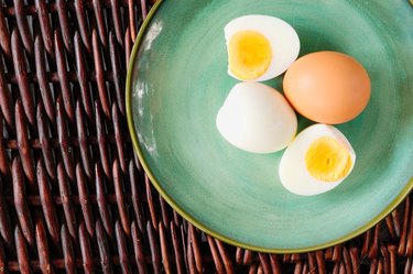 Hard-boiled egg cut and piled and with shell