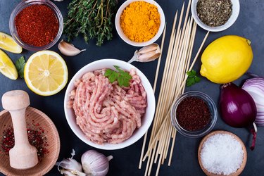 Ingredients for healthy meal, minced chicken meat kebab preparation