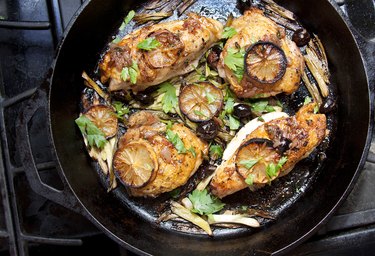 A paleo diet-friendly meal of roasted chicken with lemon and herbs to include in a paleo weight-loss meal plan