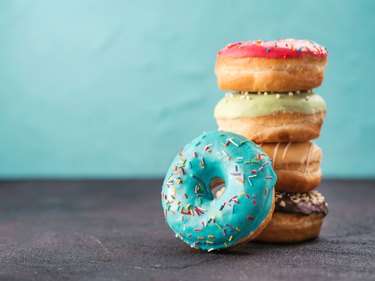 Stack of assorted donuts, copy space