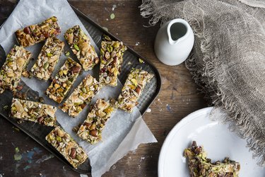 Cereal bar snack recipe made with cereal on wooden table