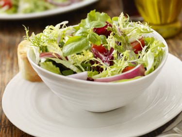Side view of a fresh garden salad in a bowl