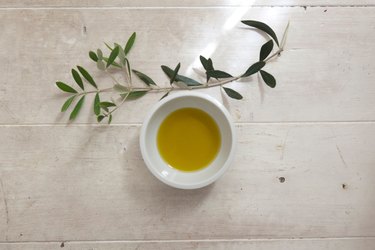 Close-Up Of Olive Oil In Bowl On Table