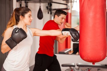 Pretty brunette learning some boxing