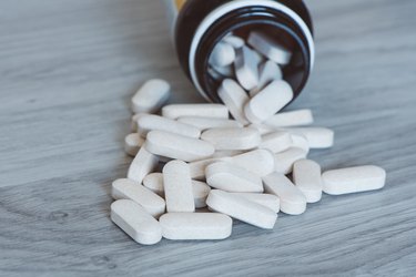 Calcium pills on table