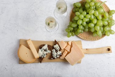Grapes, wine and cheese platter