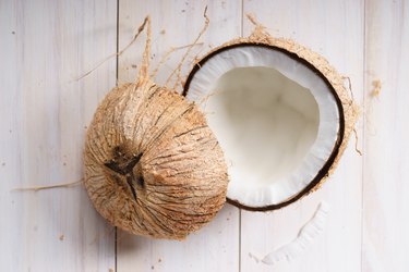raw coconut meat with shell