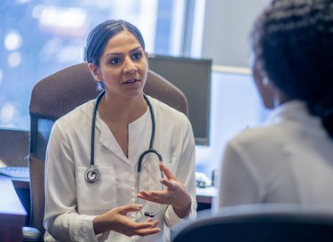 Doctor and Patient Consultation stock photo