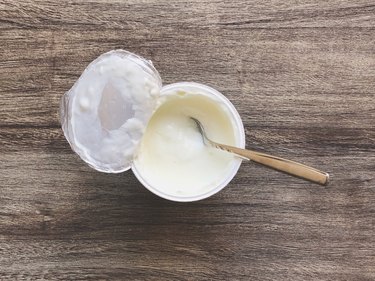 Directly Above Shot Of Yogurt In Container On Table