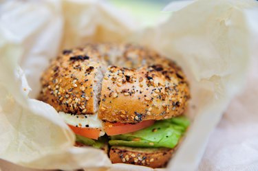 Healthy bagel with lettuce, cheese and tomato