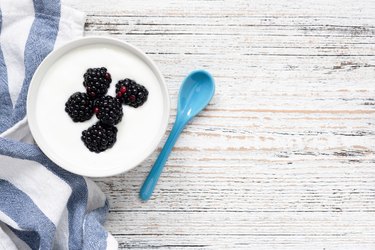 Yogurt with berries in bowl